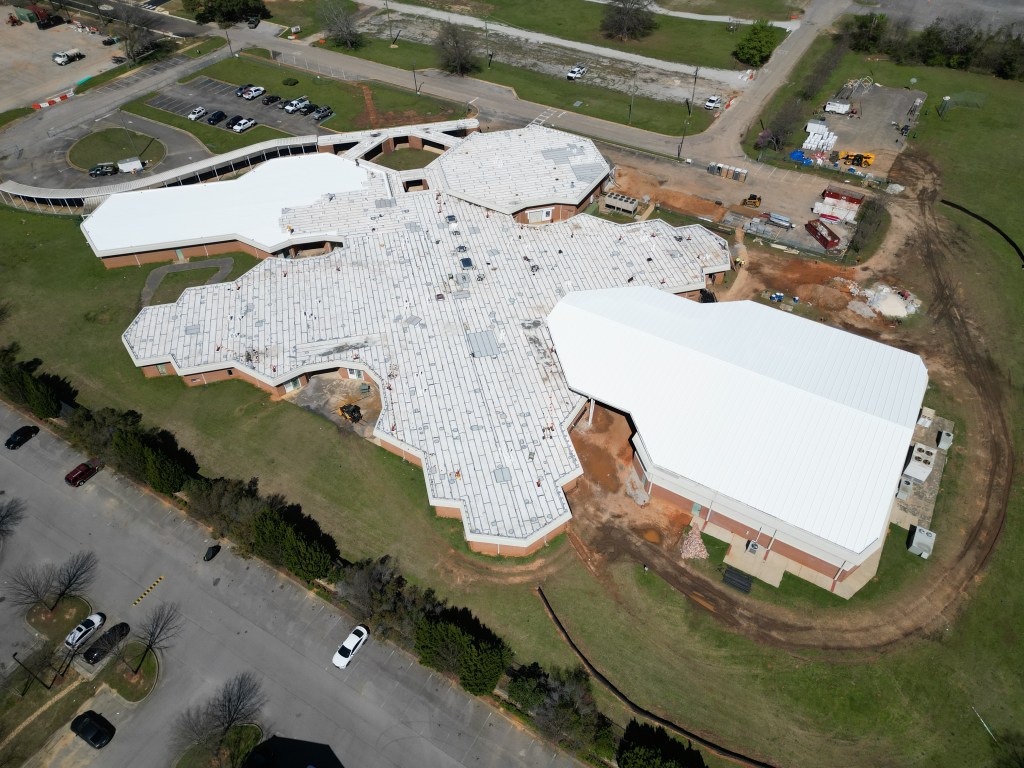 Commercial roof coatings